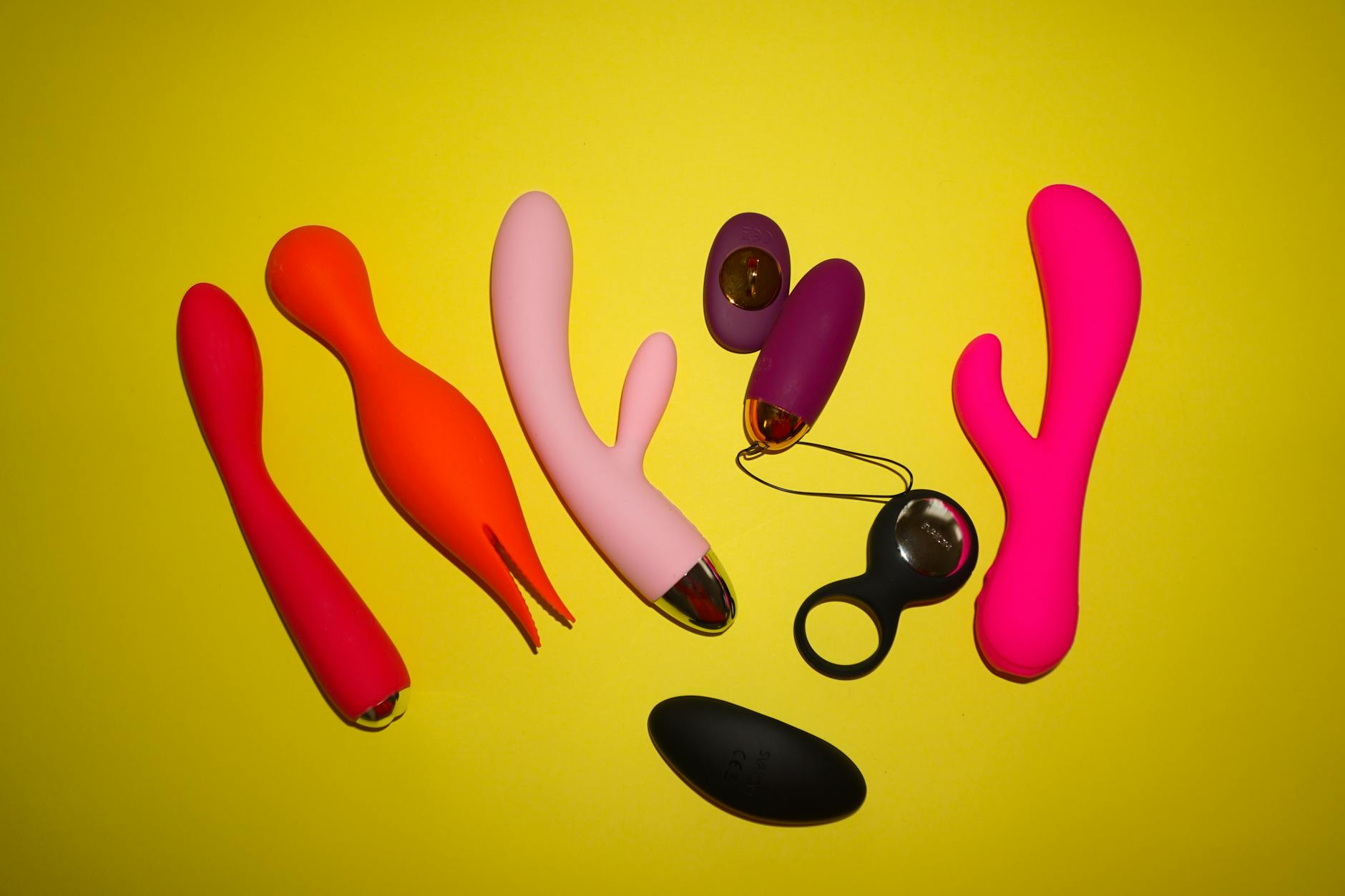 Woman holding a blue silicone vibrator, preparing for self-pleasure after a break